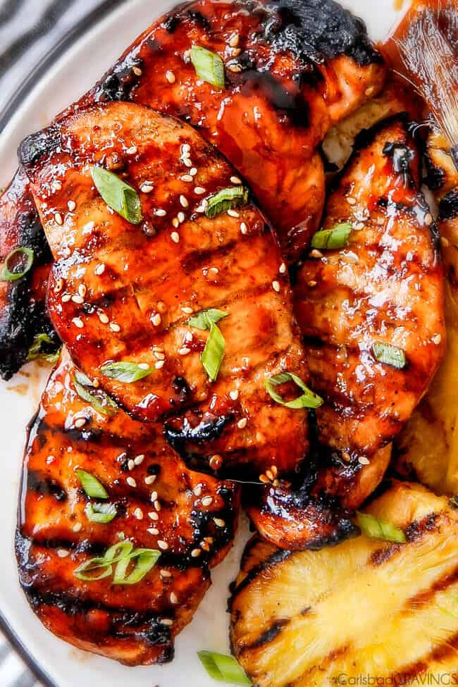 5 Minute prep Easy Teriyaki Chicken infused with Sweet Chili Sauce for added depth of flavor and YUM! The marinade doubles as the sauce for an easy family favorite that tastes better than takeout! My family loves this with rice and stir fried veggies and I love it on salad or in wraps!