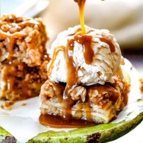 Caramel Apple Pie Blondies - these are amazing and so much easier than apple pie! A soft buttery blondie base topped with apple filling and topped with pecan crumble and caramel