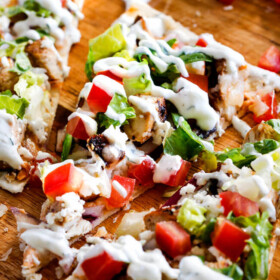 Chicken Gyro Flatbread Pizzas – these are amazing and SO quick and easy! An explosion of flavors and textures with the most flavorful Greek Chicken and easy Blender Tzatziki! Great for lunch/dinners or for appetizers and entertaining!
