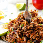 these are the BEST Pork Carnitas (Slow Cooker Mexican Pulled Pork) I have ever tried! Super juicy, easy and so much more flavorful than other versions I've tried and the crispy burnt ends are the best! Great for large crowds and for tacos, burritos, or nachos!