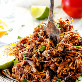 these are the BEST Pork Carnitas (Slow Cooker Mexican Pulled Pork) I have ever tried! Super juicy, easy and so much more flavorful than other versions I've tried and the crispy burnt ends are the best! Great for large crowds and for tacos, burritos, or nachos!