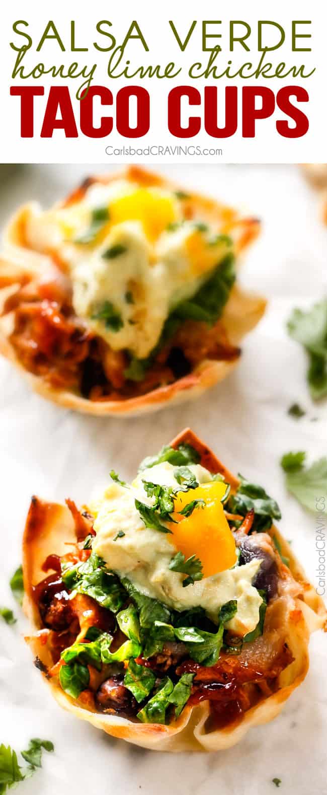 Salsa Verde Honey Lime Chicken Taco Cups - the cheesy sweet heat packed into these crispy, taco cups is so addicting and the mango guacamole is the perfect finishing touch! Whenever I serve these for an appetizer they get gobbled right up!