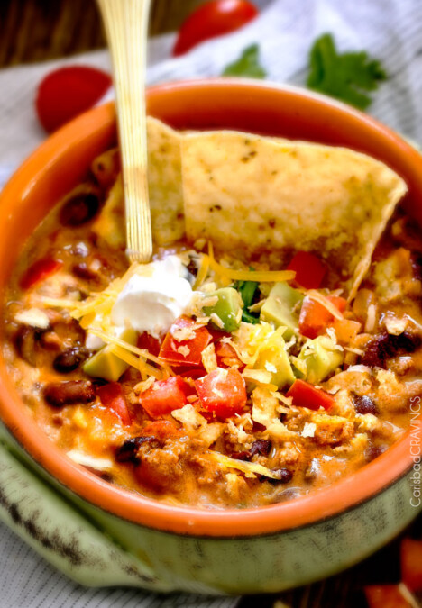 Less than 30 minutes for this ONE POT Cheesy Taco Soup! This is the ultimate comforting soup packed with all your favorite taco flavors and is SO easy and great for crowds! You haven’t had taco soup until you try this version!