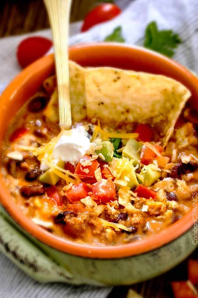 Less than 30 minutes for this ONE POT Cheesy Taco Soup! This is the ultimate comforting soup packed with all your favorite taco flavors and is SO easy and great for crowds! You haven’t had taco soup until you try this version!