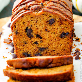 My Mom’s Famous Chocolate Chip Pumpkin Bread! So incredibly moist, infused with cinnamon, cloves and nutmeg with only 2 bowls and one whisk required! Everyone will BEG you for this recipe!