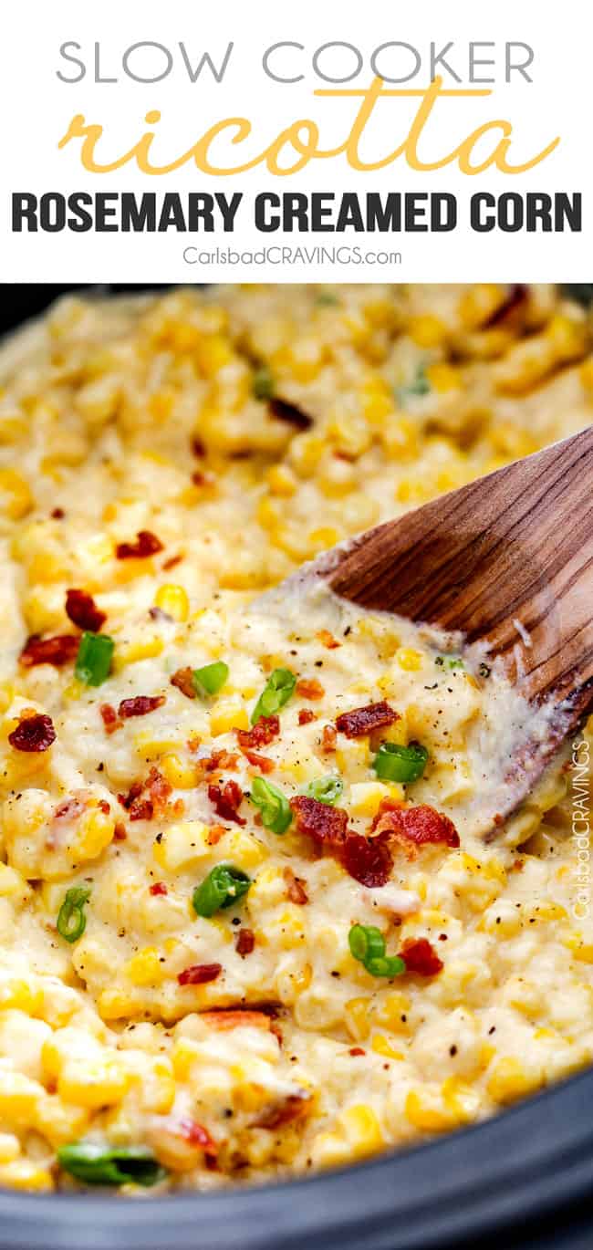 up close of creamed corn with cream cheese in the slow cooker with bacon and green onions