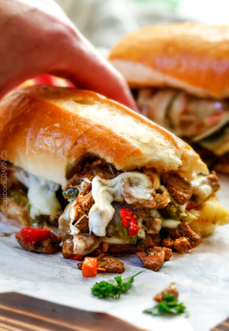 these crazy tender, flavorful Philly Cheesesteak Sandwiches are the BEST EVER! The incredible marinated steak and spiced mayo set these worlds above other recipes I've tried. You seriously haven't tried Philly Cheesesteak Sandwiches until you try these - and so much easier than you think!
