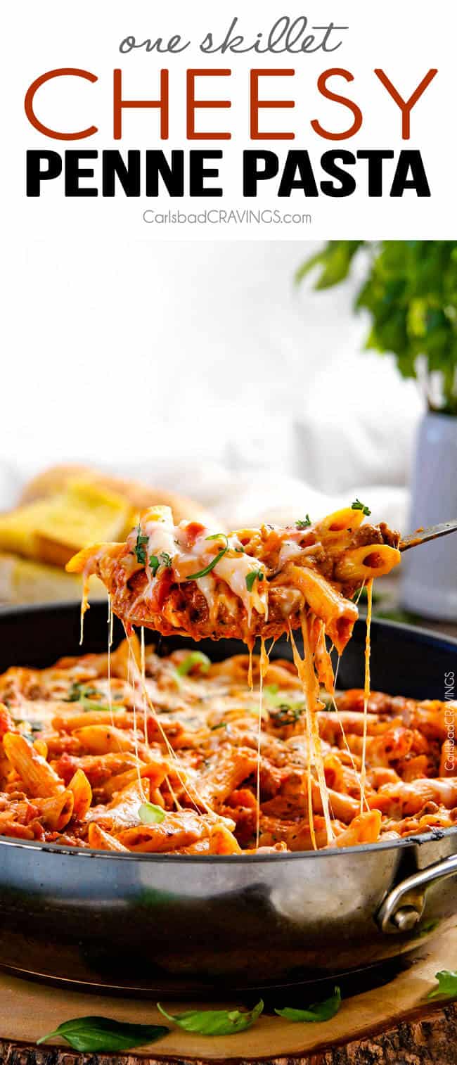 One Skillet Cheesy Penne - the best homemade ragu sauce simmered right with the pasta then loaded with cheese! My family begs me to make this weekly!