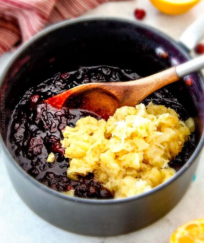 Showing how to add flavor to Pineapple Cranberry Sauce by adding crushed pineapple.