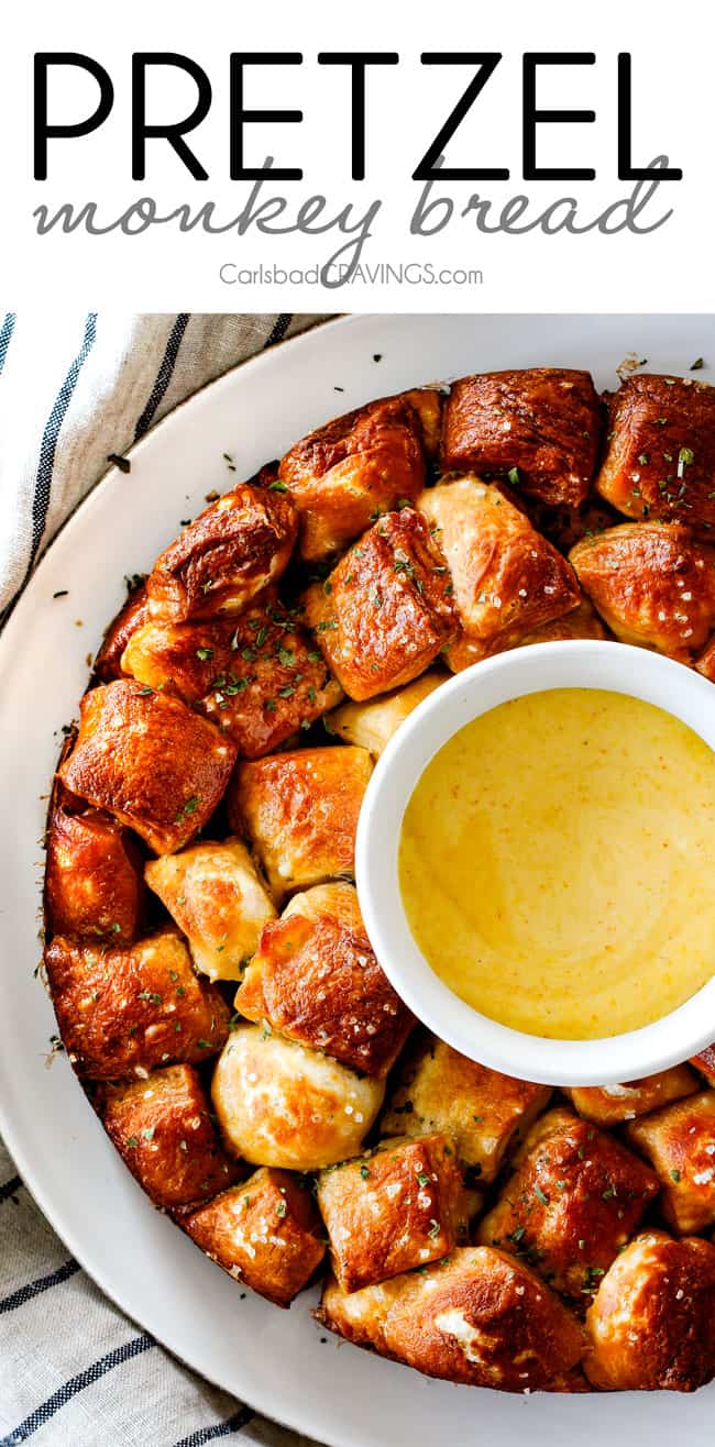 Soft, buttery Pretzel Monkey Bread with the most addicting Honey Mustard Dip! I always bring this crowd pleasing appetizer to parties and it is the first to go!