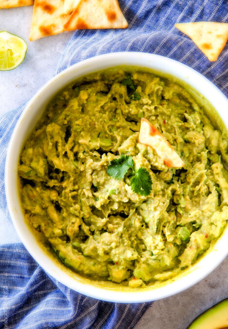 This creamy Guacamole Hummus is SO addicting and only 3 ingredients! Its crazy flavorful, healthy and super easy!