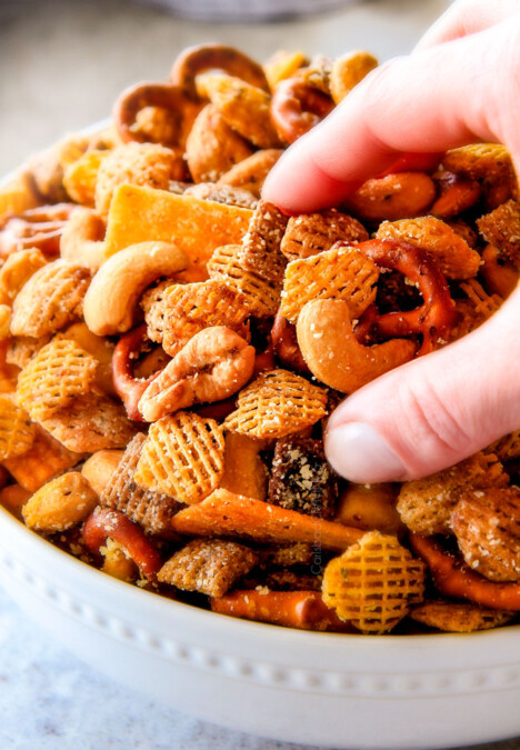 Make ahead crunchy, salty, savory Italian Parmesan Party Mix bursting with Italian flavor in each cashew, pretzel, chex mix bite! This is my go-to party snack that everyone begs me to make!