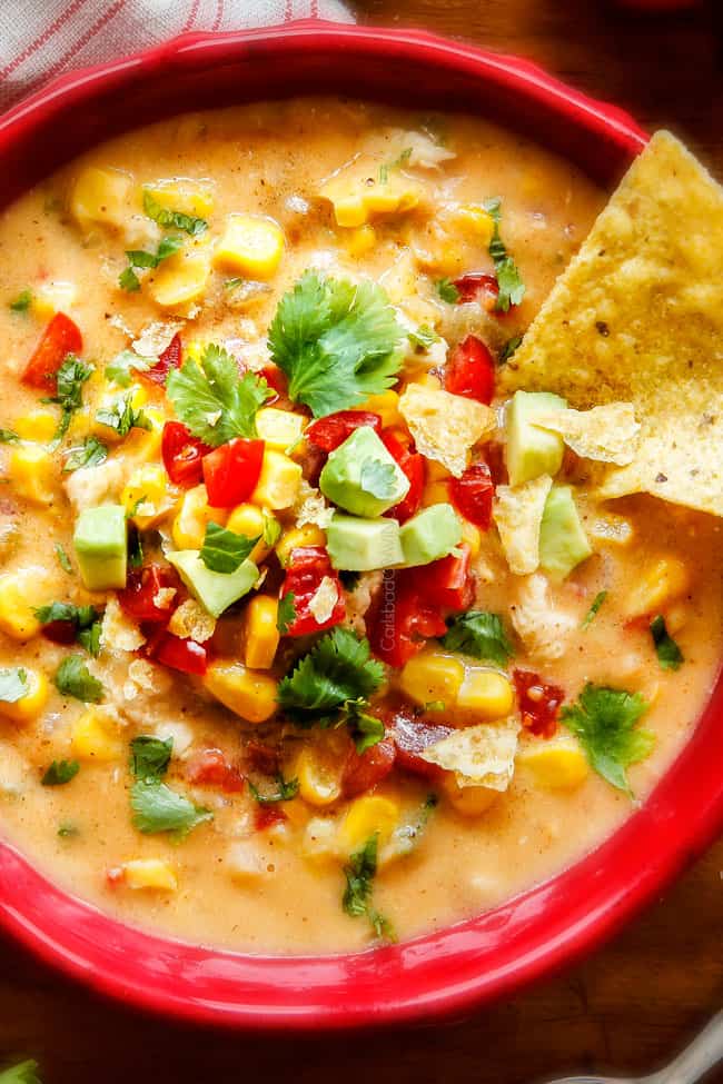 up close of a bowl full of best chicken corn chowder with chicken and corn