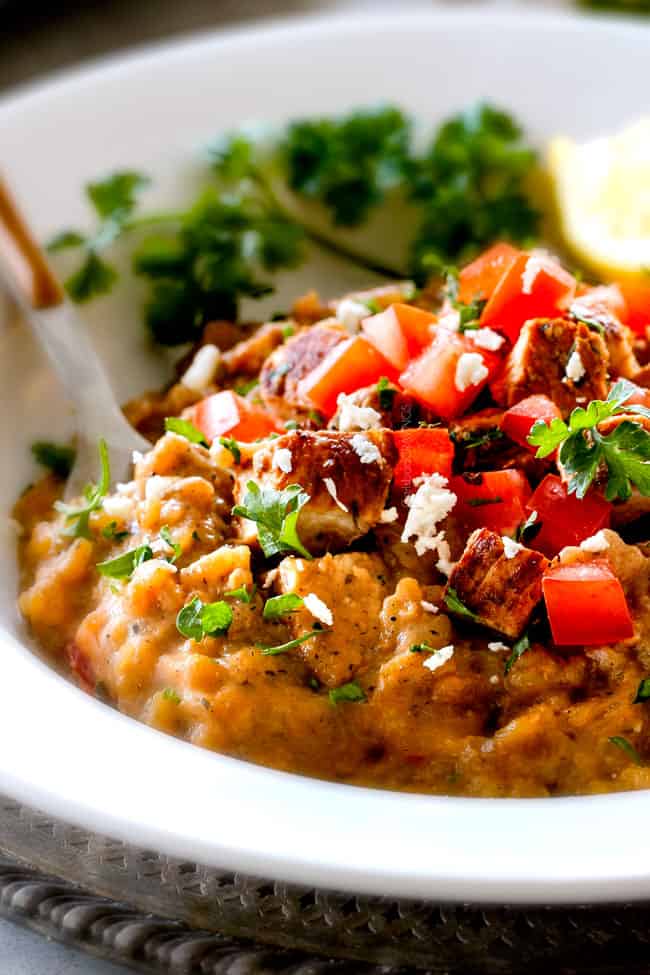 up close of chicken risotto without wine in a white bowl