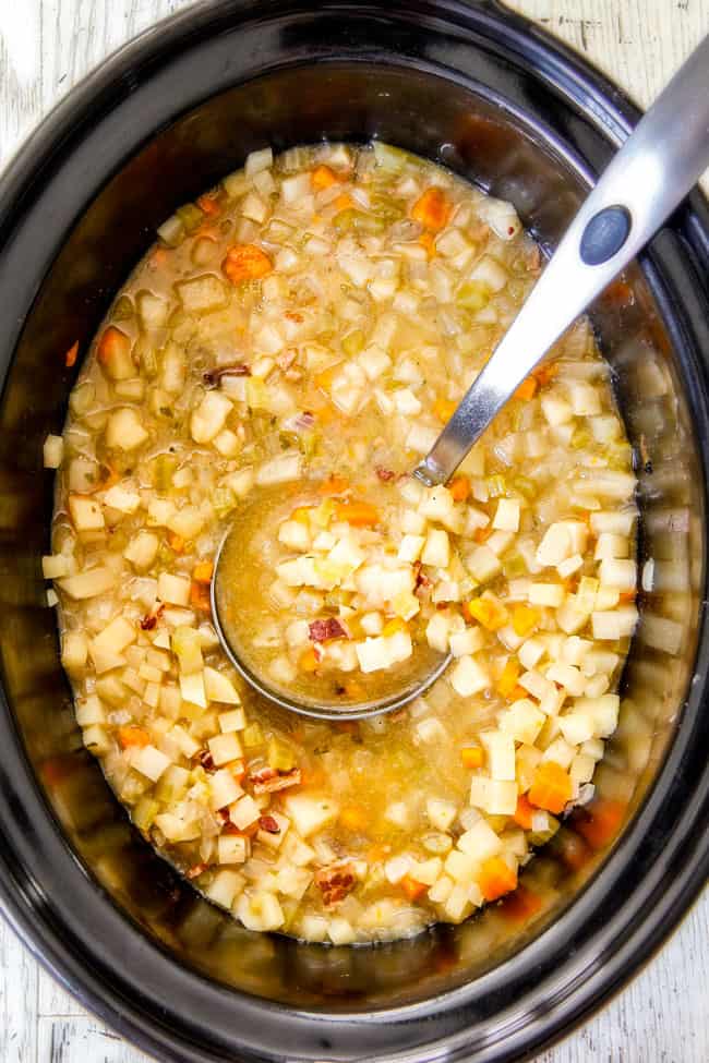showing how to make crockpot soup by cooking soup in crockpot until potatoes are fork tender