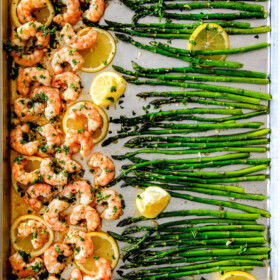 One Pan Roasted Lemon Butter Garlic Shrimp and Asparagus bursting with flavor and on your table in 15 MINUTES!  No joke!  The easiest, most satisfying meal that tastes totally gourmet!