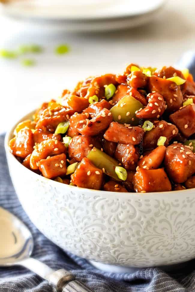 Slow Cooker Chinese Cashew Chicken- this is the best cashew chicken I have ever tried! the chicken is incredibly tender, the sauce is wonderfully flavorful and the punch of buttery, creamy cashews is out of this world! Definitely a family favorite and so much heather than takeout!