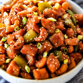 Slow Cooker Chinese Cashew Chicken- this is the best cashew chicken I have ever tried! the chicken is incredibly tender, the sauce is wonderfully flavorful and the punch of buttery, creamy cashews is out of this world! Definitely a family favorite and so much heather than takeout!