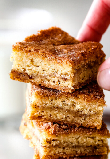 Incredibly EASY, thick, soft and chewy, buttery Snickerdoodle Cookie Bars taste just like the cookie but so much easier and less time consuming! The cinnamon and sugar crackle top is to die for!
