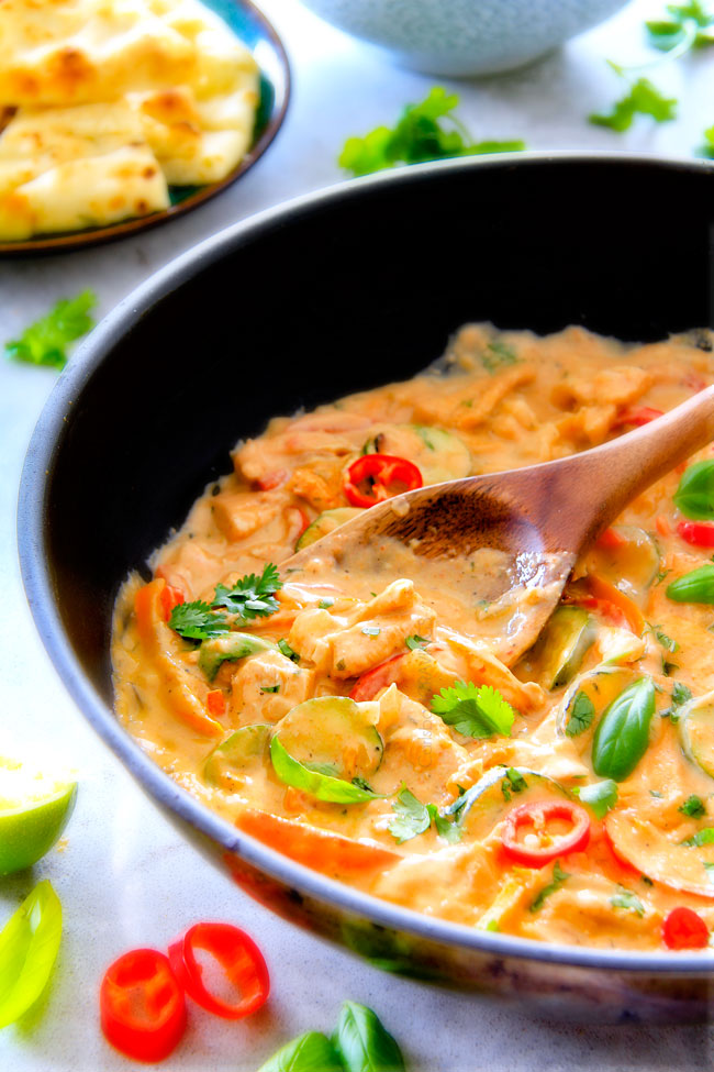 Thai Red Curry Chicken in a black sauce pan.