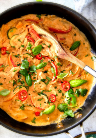 This less than 30 MINUTE Thai Red Curry Chicken tastes straight out of a restaurant! Its wonderfully thick and creamy, bursting with flavor, so easy and all in one pot! Definitely a new fav at our house!