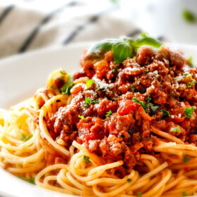 Quick and easy Weeknight Spaghetti Bolognese bursting with flavor on your table in under 30 minutes but tastes like its been simmering all day! We make this recipe more than ANY OTHER RECIPE!