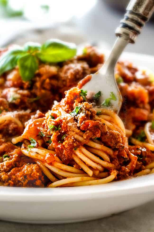 Quick and easy Weeknight Spaghetti Bolognese bursting with flavor on your table in under 30 minutes but tastes like its been simmering all day! We make this recipe more than ANY OTHER RECIPE!