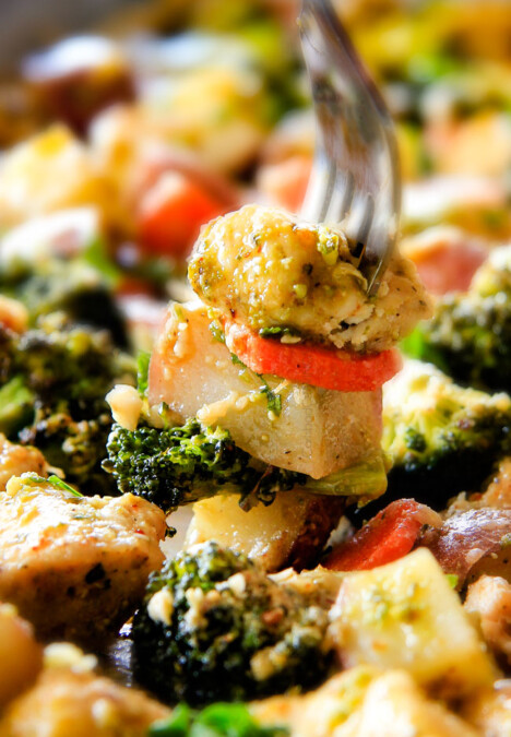 Sheet Pan Parmesan Pesto Chicken, Potatoes, Broccoli and Carrots bursting with flavor and SO EASY!! practically one pan prep making this ideal weeknight meal!
