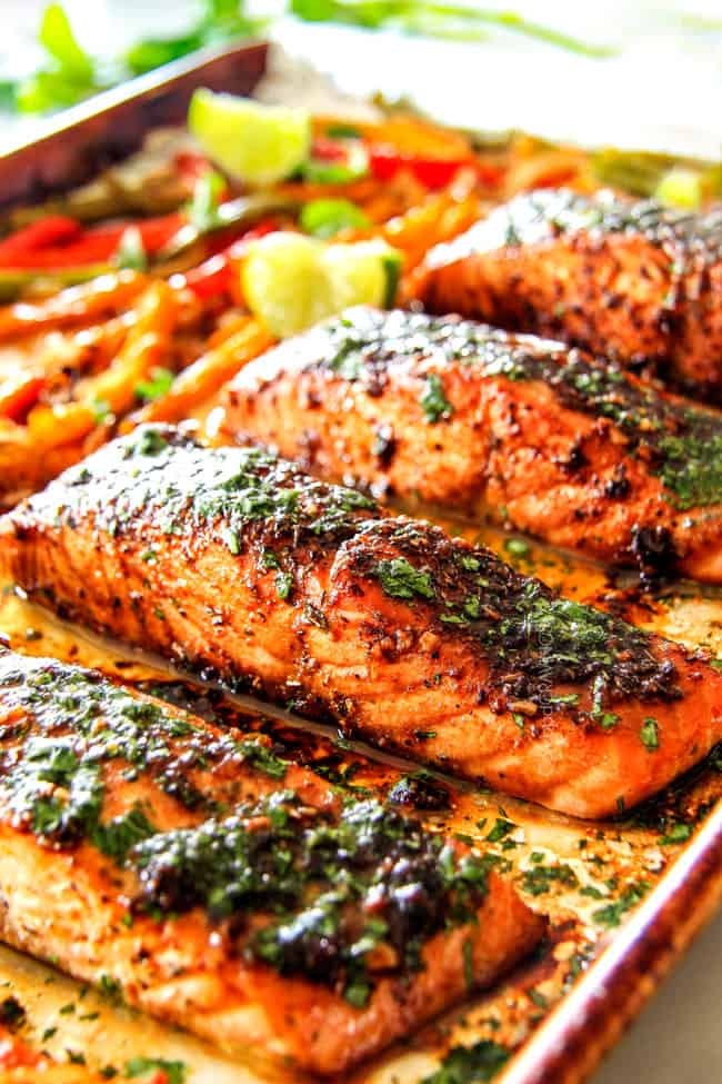 Close up view of Sheet Pan Fajita Salmon with Cilantro Lime Butter in a pan.