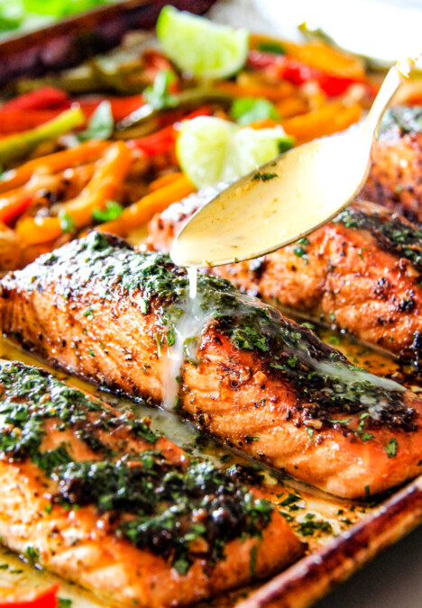 Sheet Pan Fajita Salmon with Cilantro Lime Butter - this salmon is the best I've ever tried! SO flavorful and juicy and the Cilantro Lime Butter is incredible! I serve this with rice and beans for a complete easy, delicious meal!