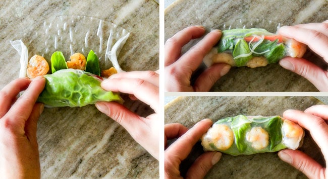 showing how to make Vietnamese spring rolls by folding rolling up rice paper
