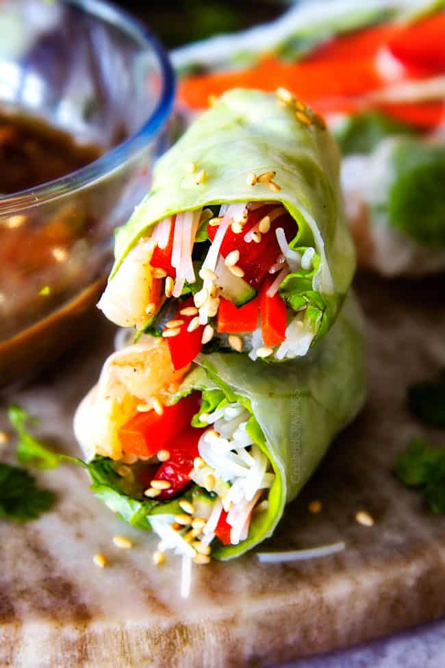 These insanely delicious Fresh Shrimp Spring Rolls are a flavor and texture explosion in every addictive bite and super easy to make with all my tips and tricks and step by step photos! and the the Pineapple Hoisin Peanut Sauce is EVERYTHING!