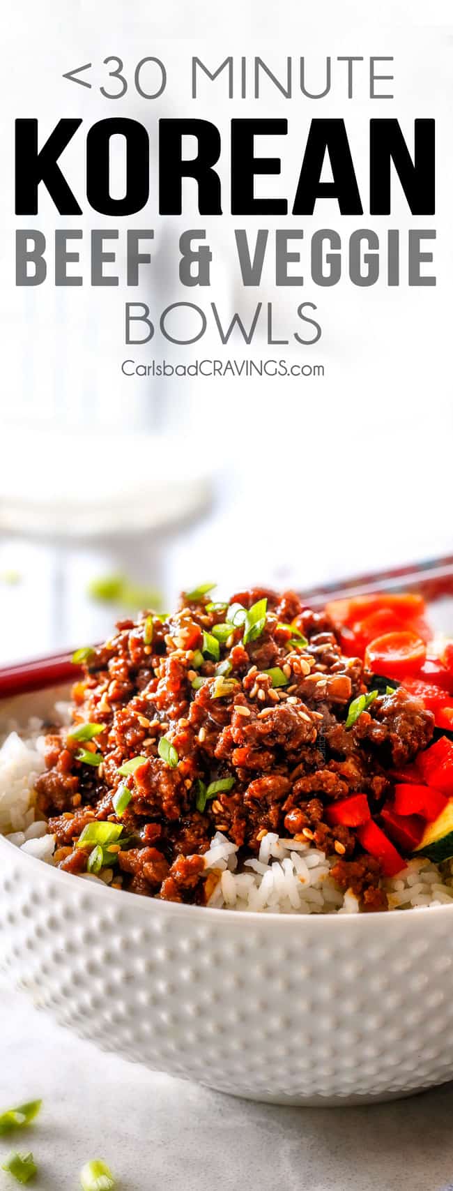 Easy Korean Beef Bowls with ground beef, carrot and zucchini in a white bowl.