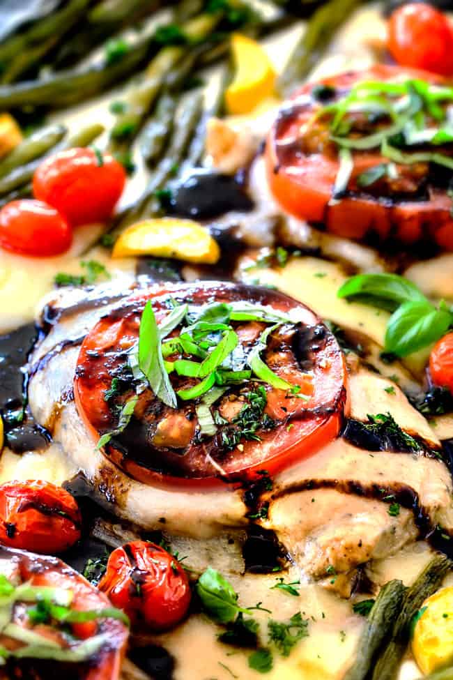 up close Baked Chicken Caprese with chicken breasts on a sheet pan