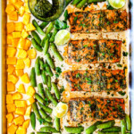 Easy SHEET PAN Asian Chimichurri Salmon is the most tender, flavorful salmon you will ever make - no joke! all cooked with pineapple and snap peas for a complete meal-in-one! An easy, satisfying dinner that tastes totally gourmet!
