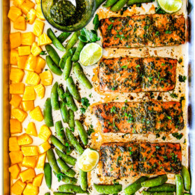 Easy SHEET PAN Asian Chimichurri Salmon is the most tender, flavorful salmon you will ever make - no joke! all cooked with pineapple and snap peas for a complete meal-in-one! An easy, satisfying dinner that tastes totally gourmet!
