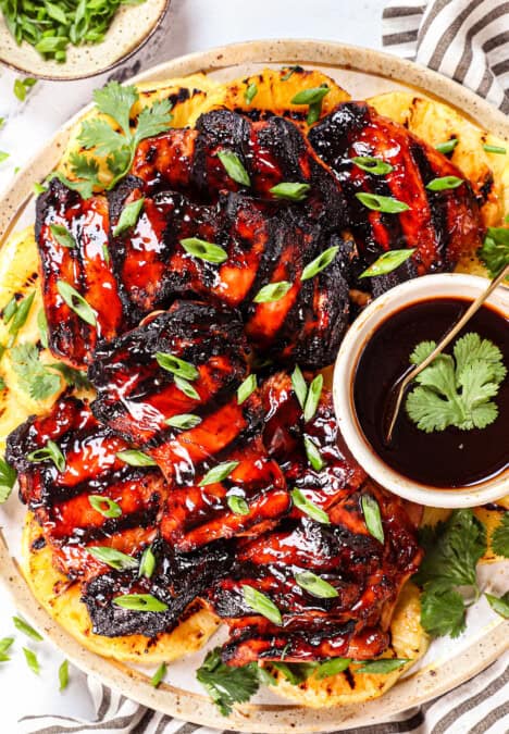 top view of serving Huli Huli Chicken recipe being on a platter garnished with green onions