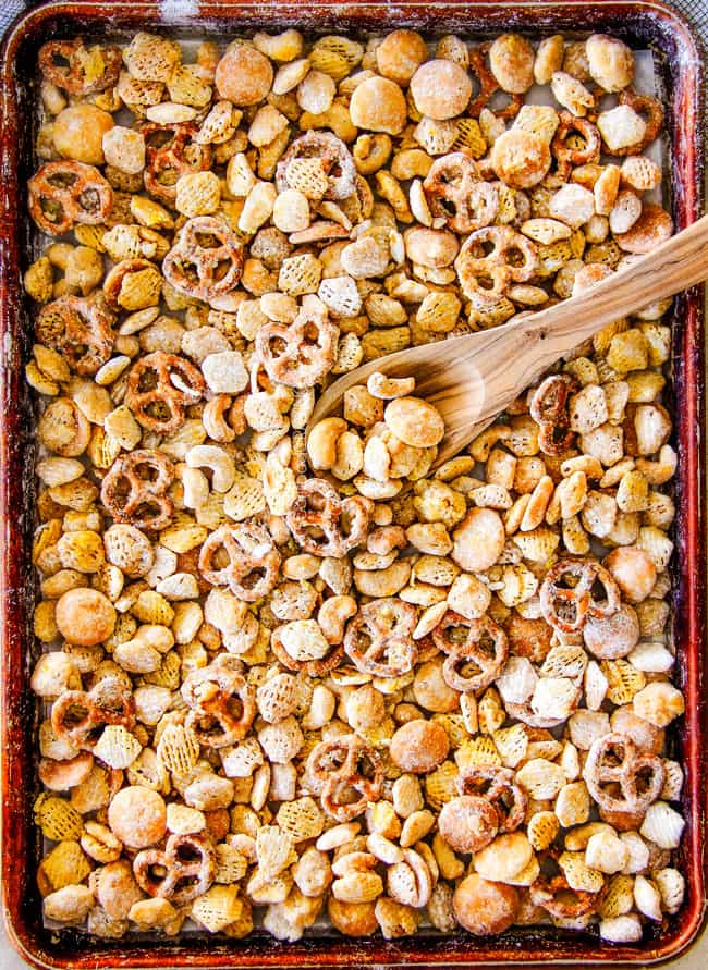 Everyone begs me to bring this seriously addicting Lemon Snack Mix to every party and get together!   Its super easy, make ahead,  sweet and tangy and coated in AMAZING White Chocolate Lemon Glaze!  Your friends will love it!