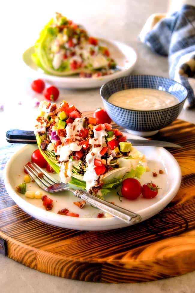 Outback Wedge Salad smothered in the most amazing creamy, decadent Blue Cheese Ranch and Balsamic Reduction is a flavor/texture lovers dream and crazy easy to make!  