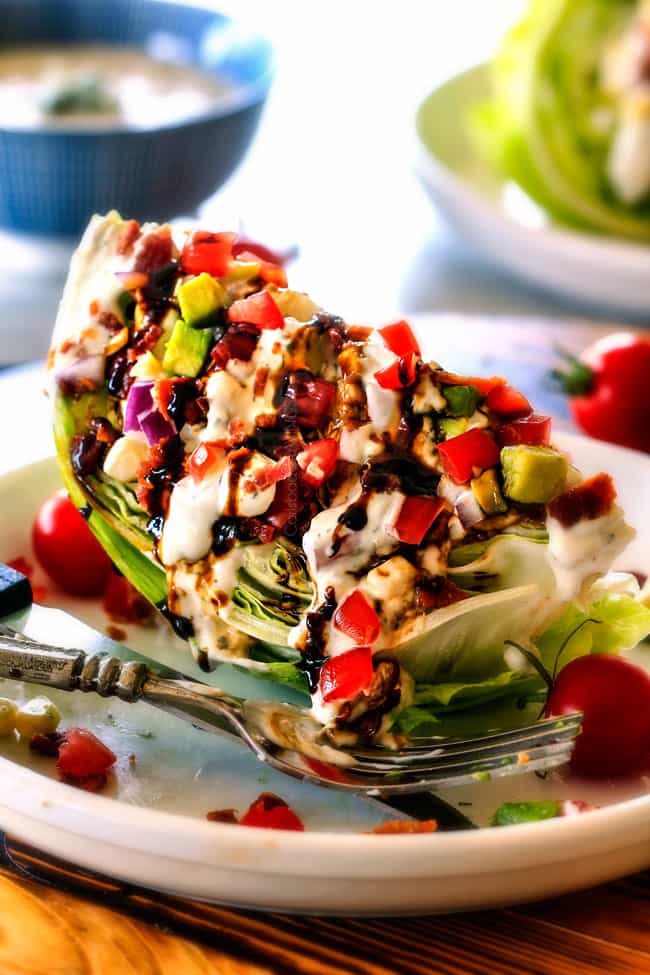 side view of easy Wedge Salad topped with blue cheese dressing