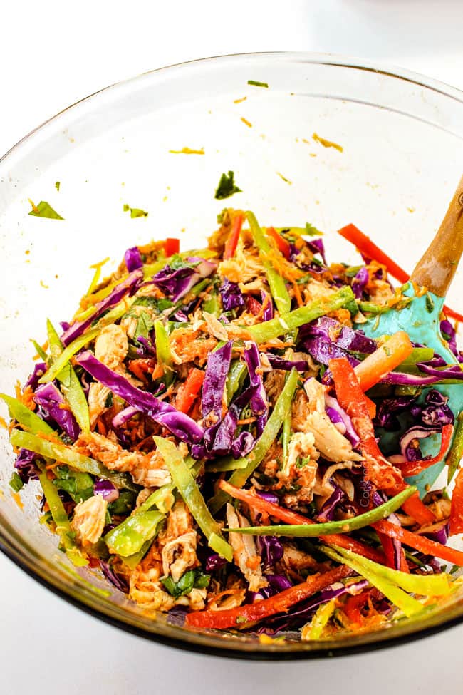 Showing how to make Chinese Chicken Salad Wraps.