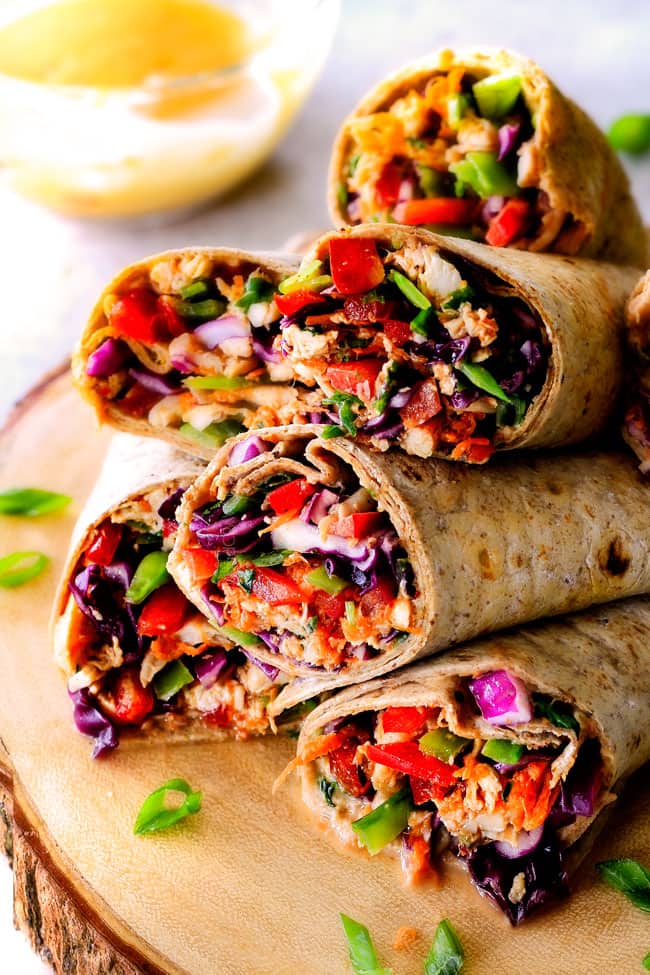 25 MINUTE fresh and crunchy Chinese Chicken Salad Wraps are your favorite Chinese salad in easy, satisfying, healthy portable wrap form!  The vibrant dressing is amazing and the addition of Sweet Chili Sauce takes these to a whole new level!   I love having this filling on hand! 