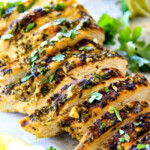 Easy, juicy, flavorful Cilantro Lime Chicken seeping with flavor is a meal in itself or instantly transforms salads, tacos, burritos, wraps, etc into the most epic meal EVER! I love having this chicken on hand!