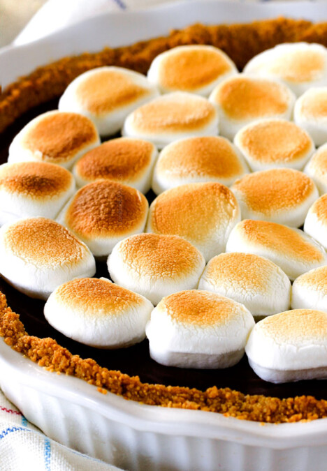Make ahead Almost No Bake Nutella S'mores Pie is decadantly rich and creamy topped with golden marshmallows and SO EASY!  I made this for a dinner party and everyone wanted the recipe! 