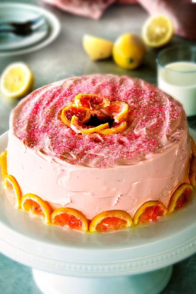 Pink Lemonade Pound Cake with sprinkles and lemons.