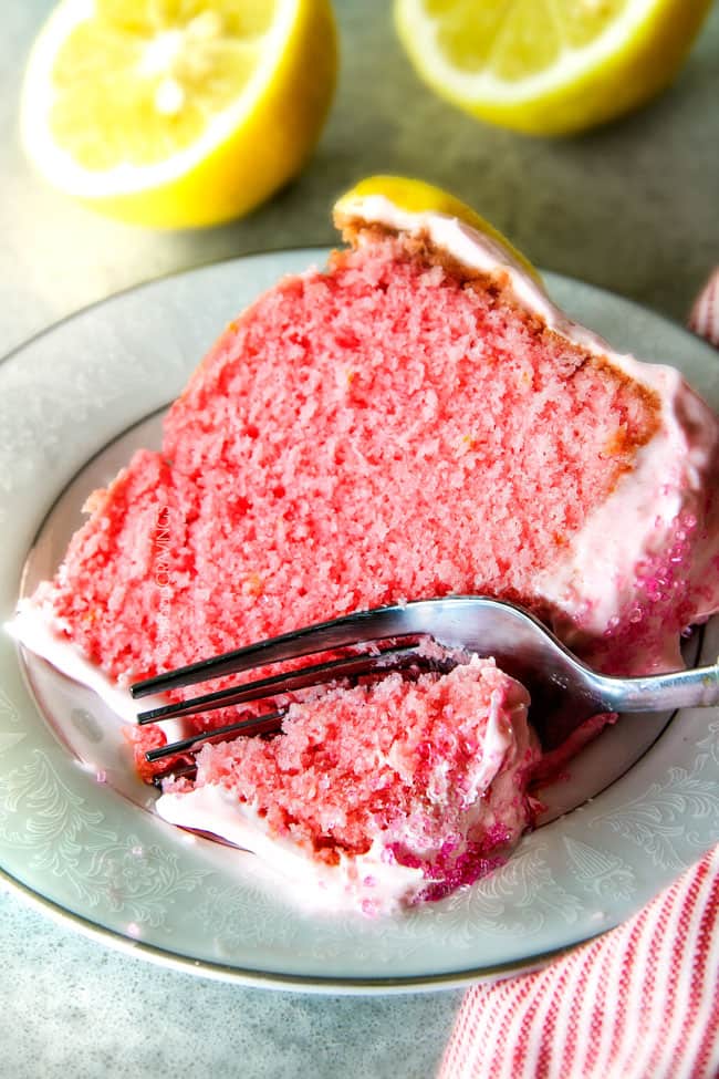 Fork cutting into Pink Lemonade Pound Cake.