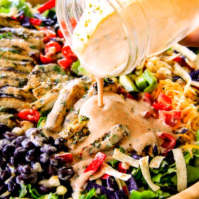 I couldn't stop eating this Cilantro Lime Chicken Taco Salad!  Its bursting with tender, juicy chicken and the sweet & tangy Creamy Baja Catalina Dressing is out of this world delicious!  This combo is pure heaven!