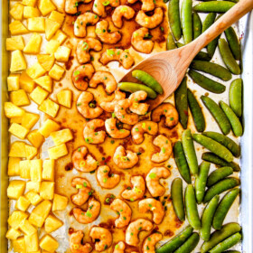 I am in love with this Sheet Pan Teriyaki Shrimp, Pineapple and Snap Peas!  Its SO easy, healthy, a meal-in-one and the homemade Teriyaki sauce is the best I've ever had (DON'T be tempted to use store bought!)!   I'm always keeping frozen shrimp on hand so I can make this any time! 