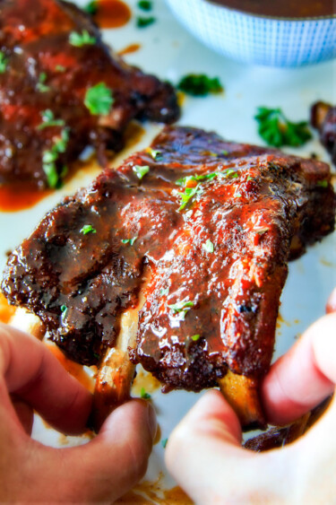 Slow Cooker Honey Buffalo Ribs (Video!) - Carlsbad Cravings