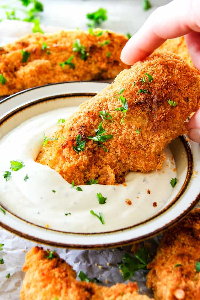 Baked Cheddar Ranch Chicken Tenders with ranch dipping sauce. 